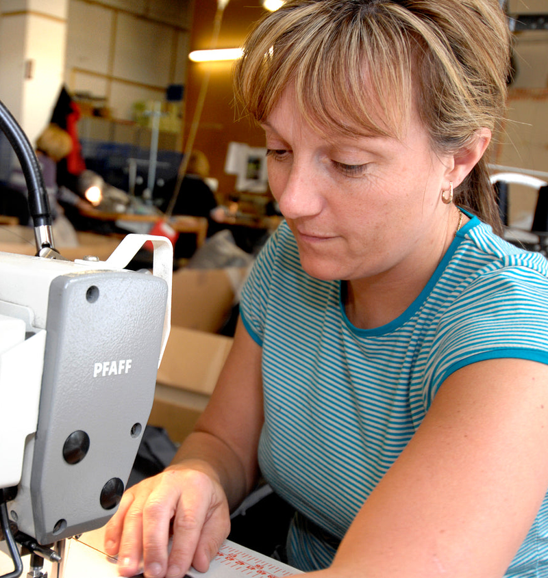 A machinist sewing at the Snugpak UK factory.